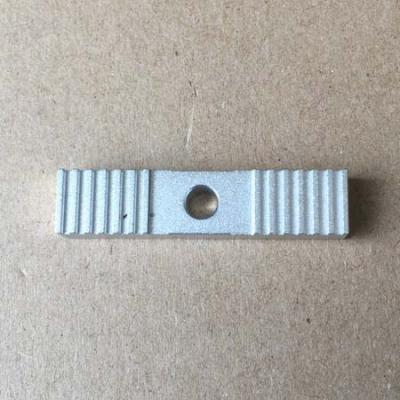 Toothed clamp for open ended belt