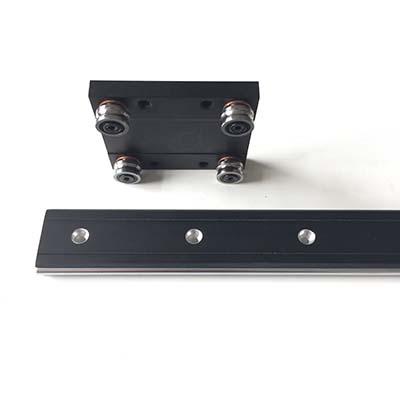 Low profile outer roller bearing linear guide